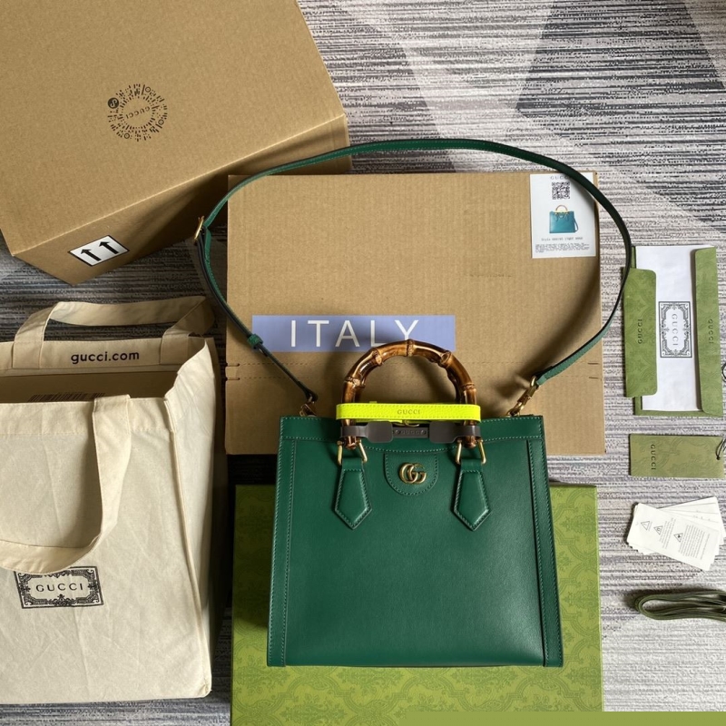 G*u*i top handle bags